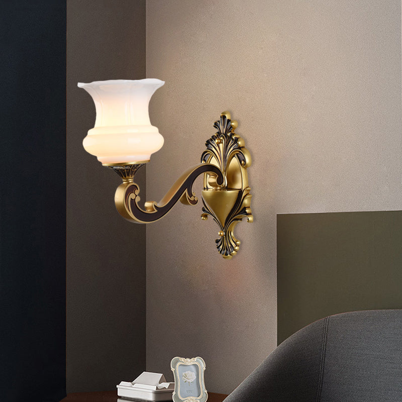 Rynx | Vintage Curved Arm Wall Lighting Idea 1/2-Ball Metal Wall Lamp in Brass with Floral Milk Glass Shade