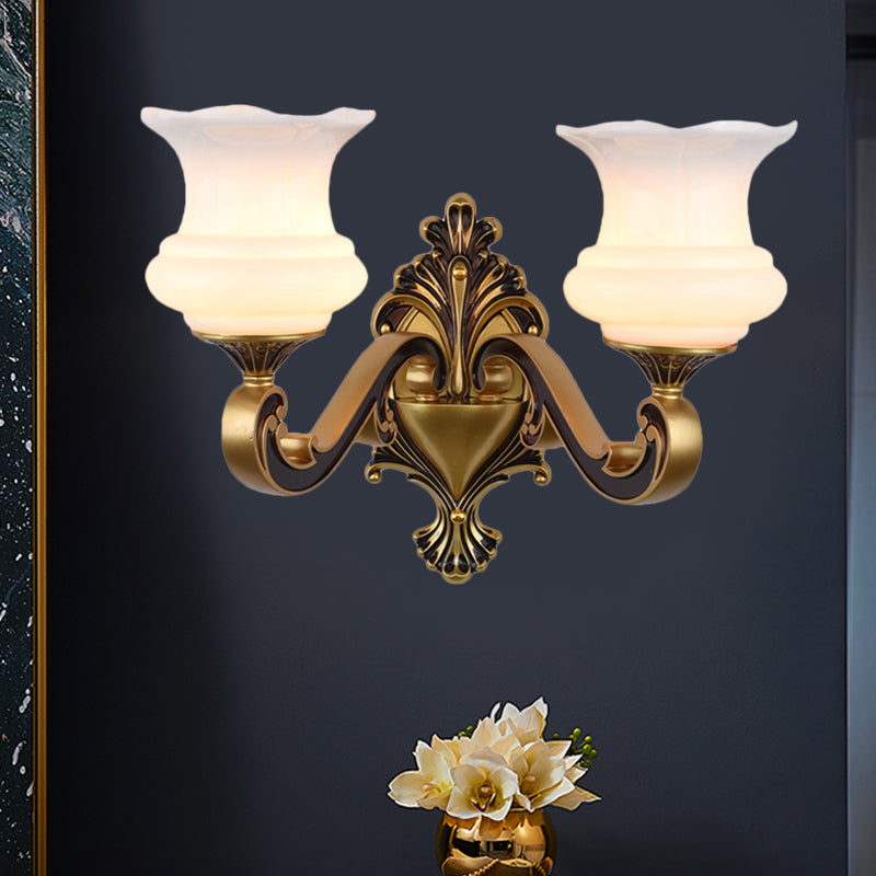 Rynx | Vintage Curved Arm Wall Lighting Idea 1/2-Ball Metal Wall Lamp in Brass with Floral Milk Glass Shade