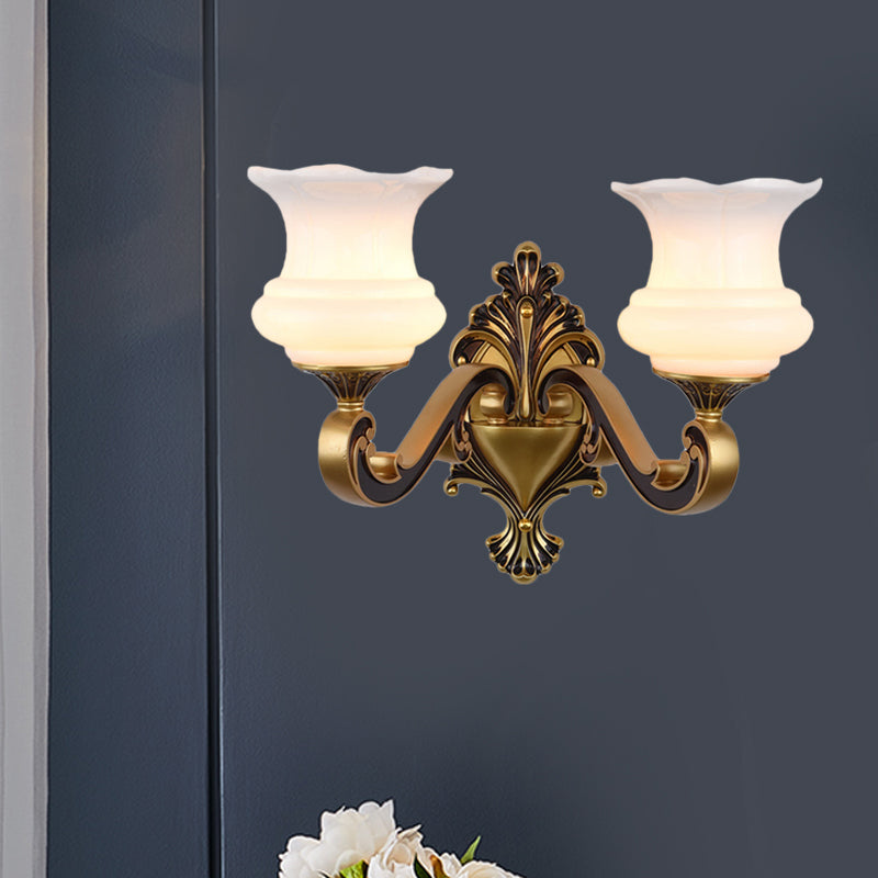 Rynx | Vintage Curved Arm Wall Lighting Idea 1/2-Ball Metal Wall Lamp in Brass with Floral Milk Glass Shade