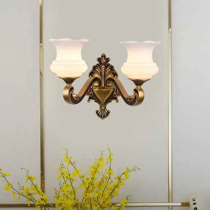 Rynx | Vintage Curved Arm Wall Lighting Idea 1/2-Ball Metal Wall Lamp in Brass with Floral Milk Glass Shade
