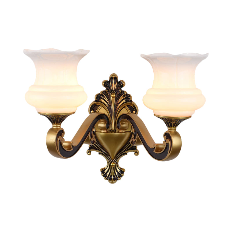 Rynx | Vintage Curved Arm Wall Lighting Idea 1/2-Ball Metal Wall Lamp in Brass with Floral Milk Glass Shade