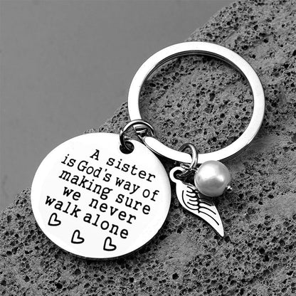 Rynx | A sister is God's way of ensuring that we never walk alone keychain