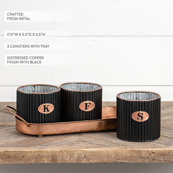 Rynx | Black metal canisters with copper-coated plate, set of 3
