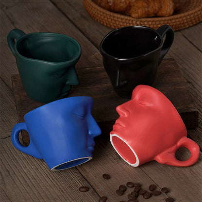 Rynx | Metal touching face, creative ceramic kiss coffee mug