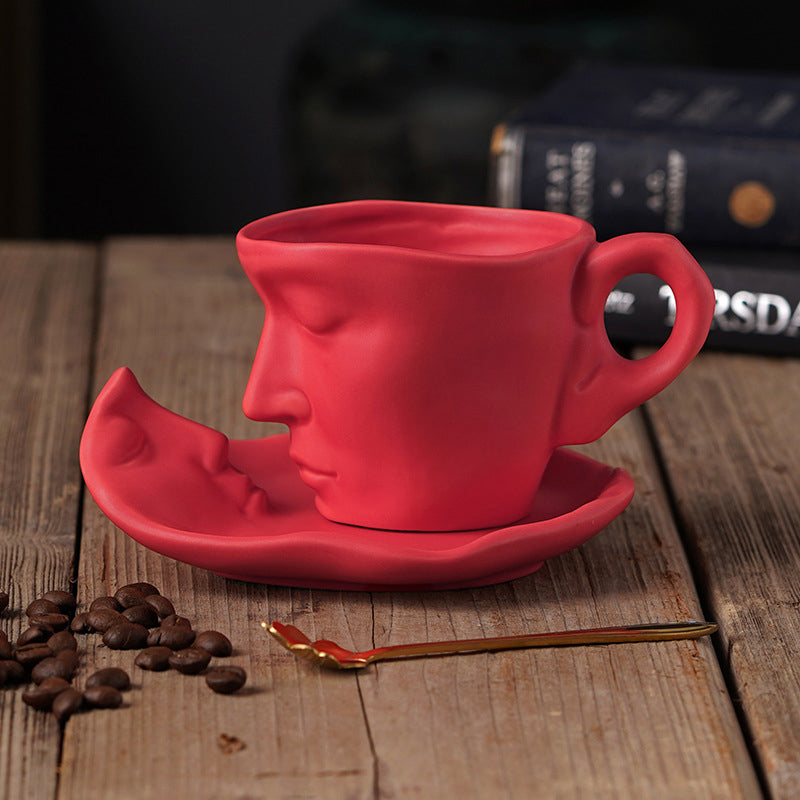 Rynx | Metal touching face, creative ceramic kiss coffee mug