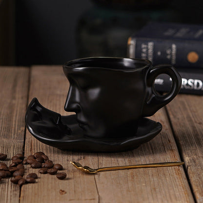 Rynx | Metal touching face, creative ceramic kiss coffee mug