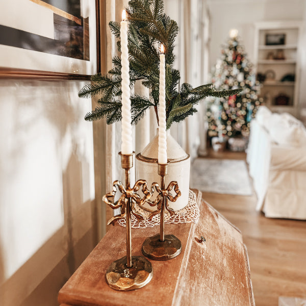 Rynx | Ornate bows antique gold cast iron candle holders, set of two