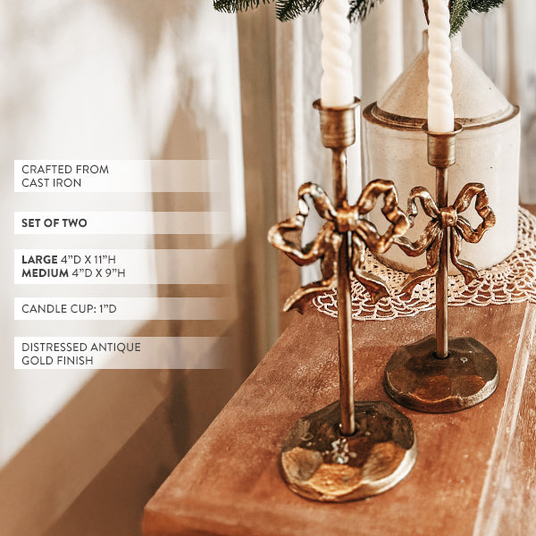 Rynx | Ornate bows antique gold cast iron candle holders, set of two