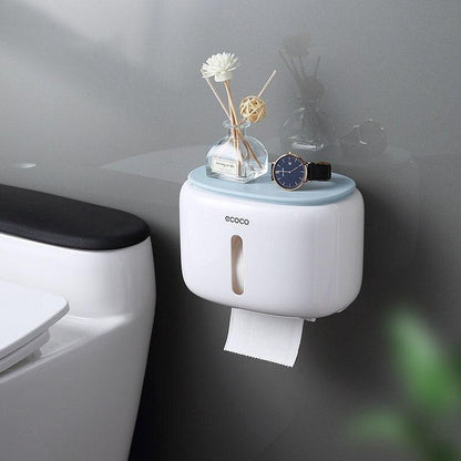 Rynx | Bathroom organizer with phone holder and quick-change toilet paper function