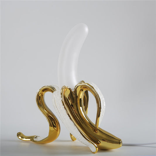 Rynx | Chiquita Charm - Playful table lamp with banana and USB connection | Perfect addition to any home or office