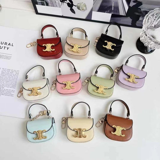 Rynx | Luxurious branded leather handbag style for Airpod with gold-colored accent buckle