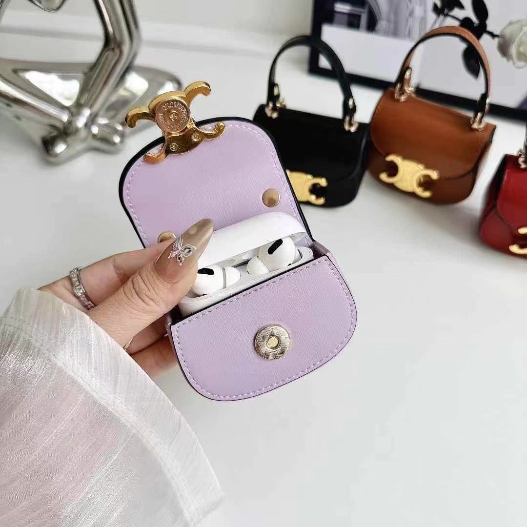 Rynx | Luxurious branded leather handbag style for Airpod with gold-colored accent buckle