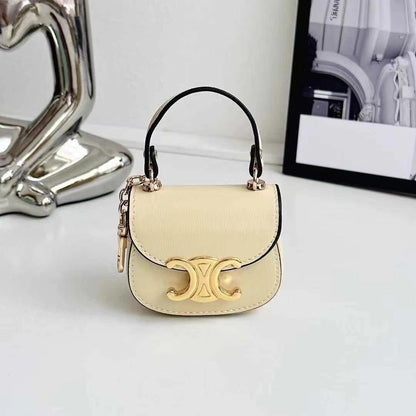 Rynx | Luxurious branded leather handbag style for Airpod with gold-colored accent buckle