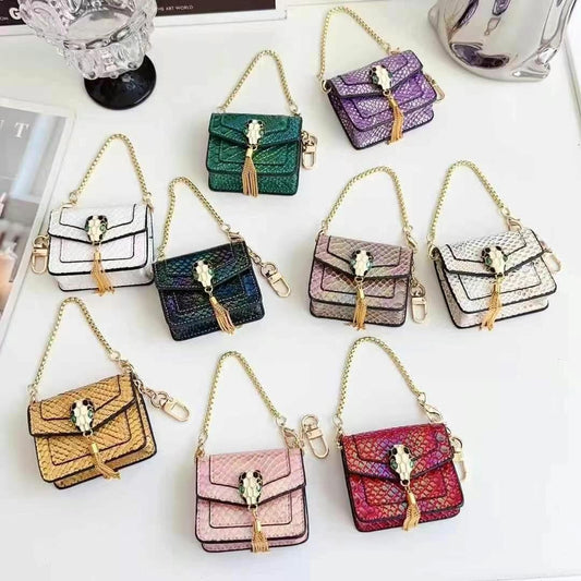 Rynx | Mini Luxury Bag Style AirPods Case – Snake Pattern PU Leather with Tassel & Chain
