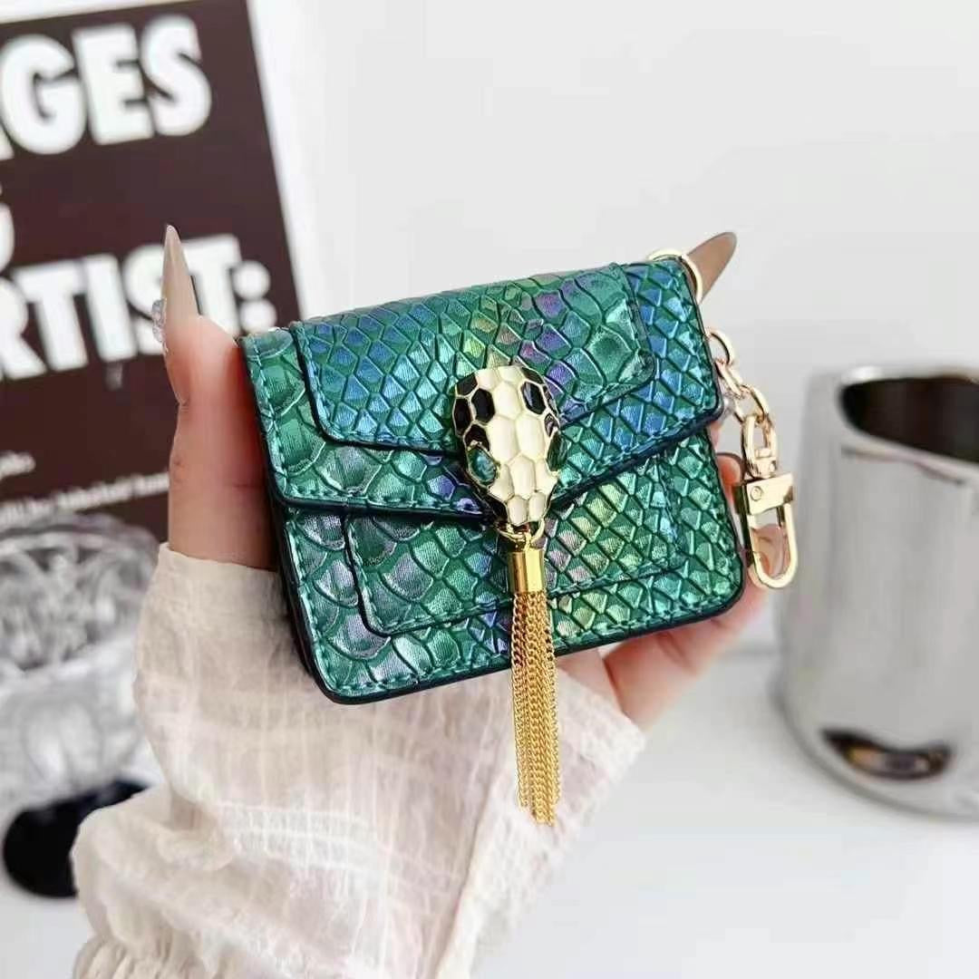 Rynx | Mini Luxury Bag Style AirPods Case – Snake Pattern PU Leather with Tassel & Chain