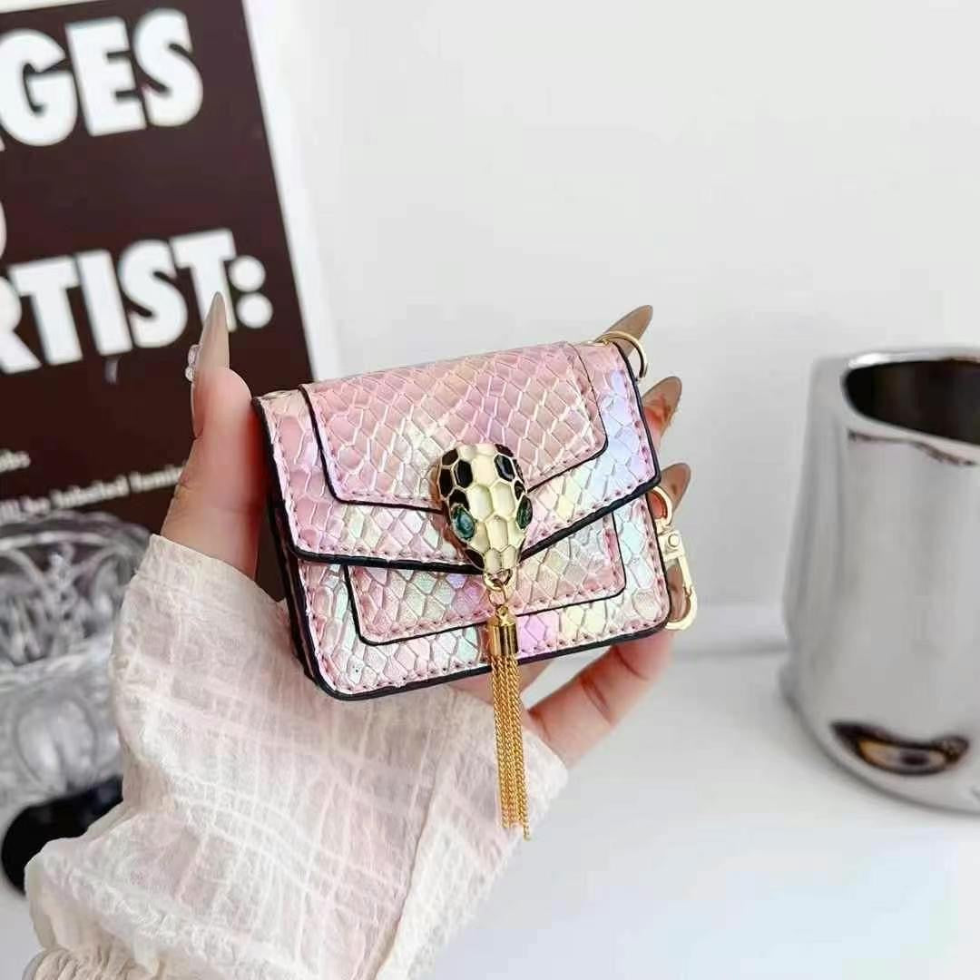 Rynx | Mini Luxury Bag Style AirPods Case – Snake Pattern PU Leather with Tassel & Chain