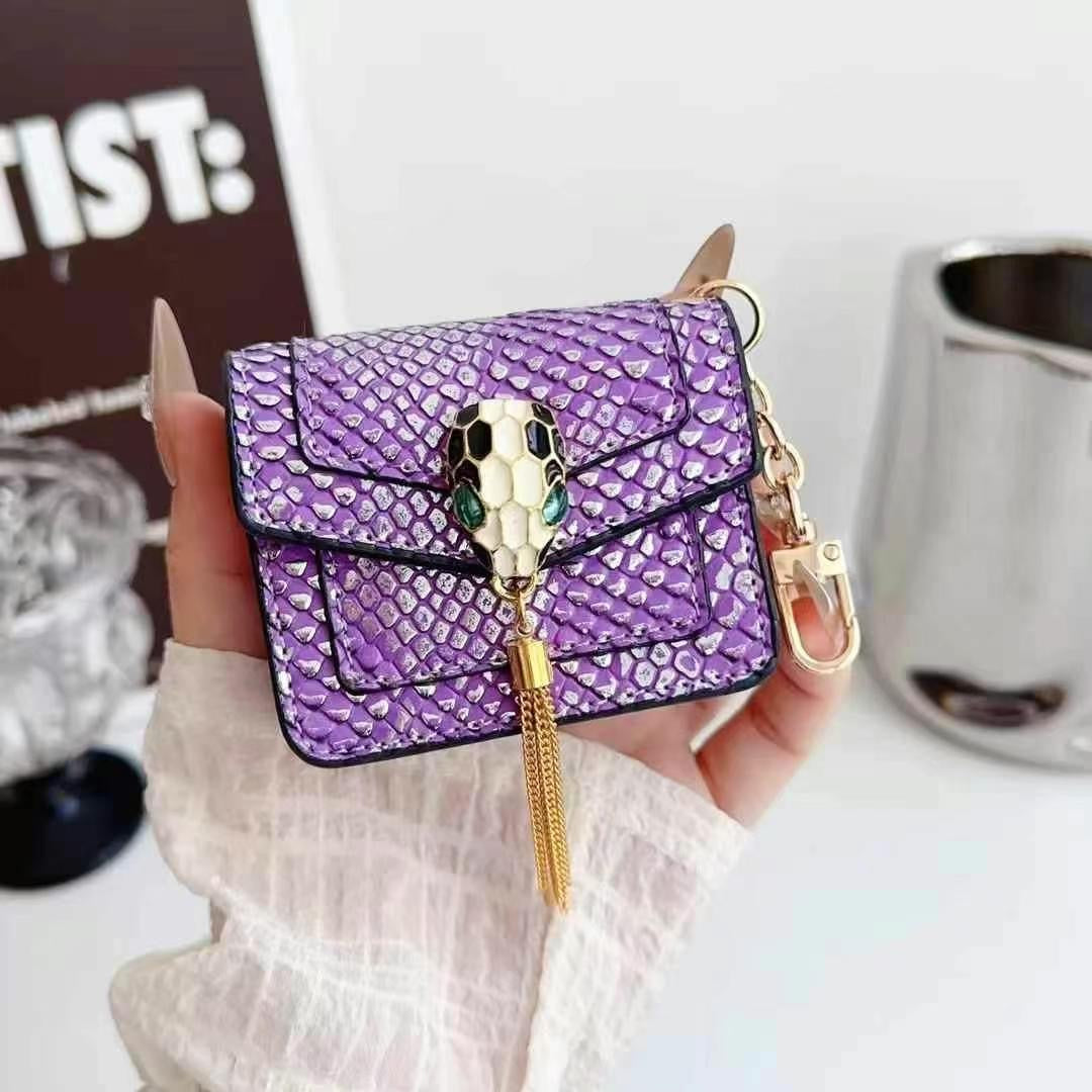 Rynx | Mini Luxury Bag Style AirPods Case – Snake Pattern PU Leather with Tassel & Chain