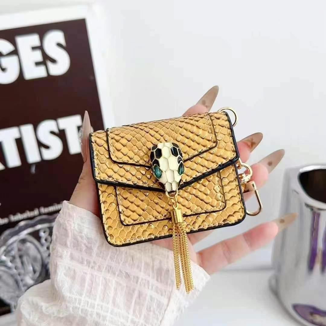 Rynx | Mini Luxury Bag Style AirPods Case – Snake Pattern PU Leather with Tassel & Chain
