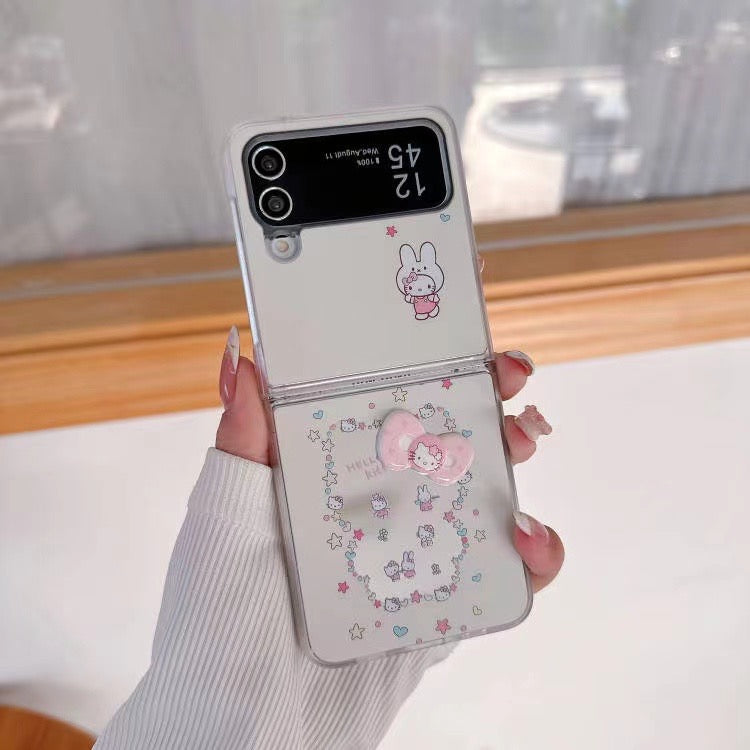 Rynx | Cute Cartoon Flip Samsung Z Flip Case – Soft Pastel Kitty Design with 3D Bow & Bead Carry Charm