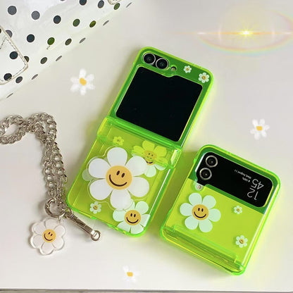 Rynx | Green Smiley Daisy Samsung Z Flip Case – Clear Floral Cover with Charm Chain