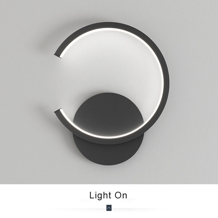 Rynx | Minimalist round LED wall lamp with arm, 1 light