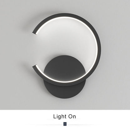 Rynx | Minimalist round LED wall lamp with arm, 1 light