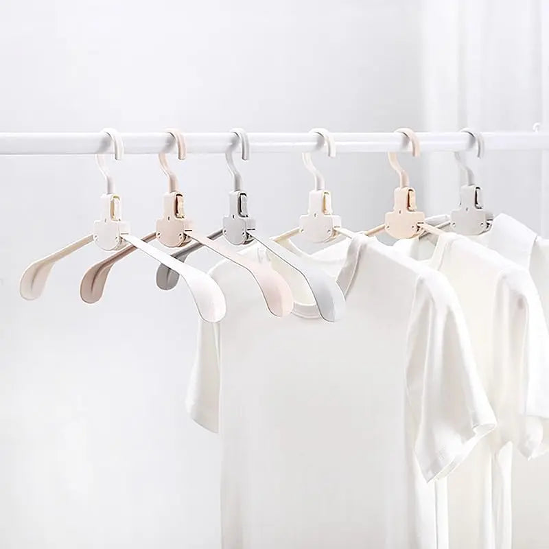 Rynx | Robust foldable clothes hanger with one-button function and crease pRedection