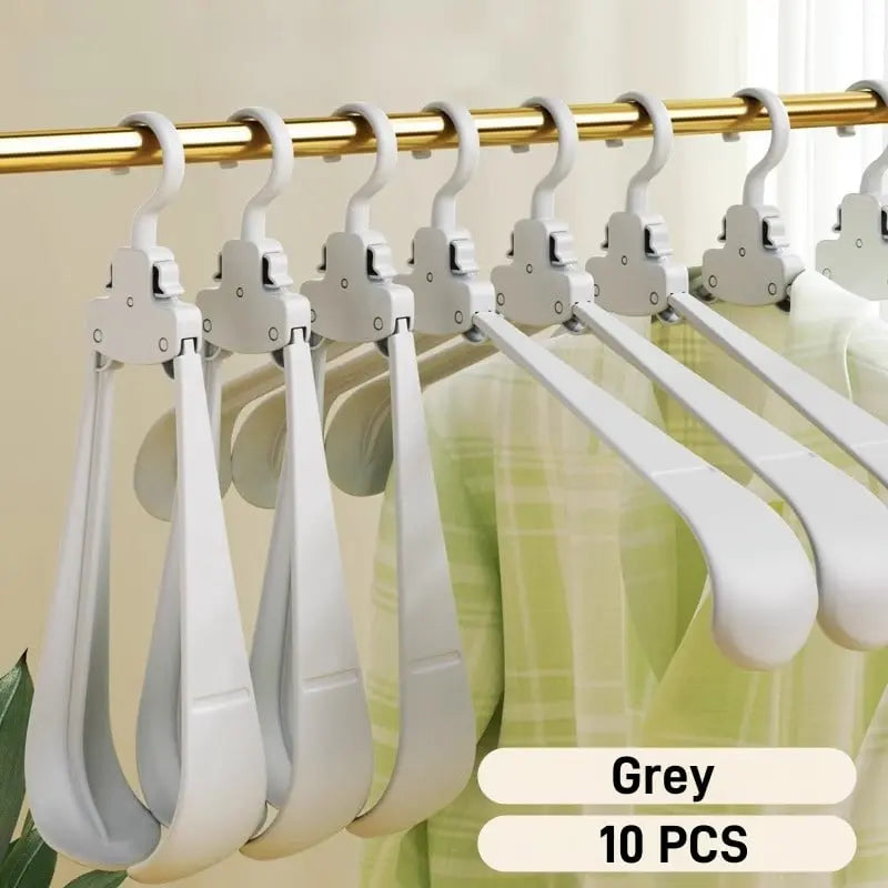 Rynx | Robust foldable clothes hanger with one-button function and crease pRedection