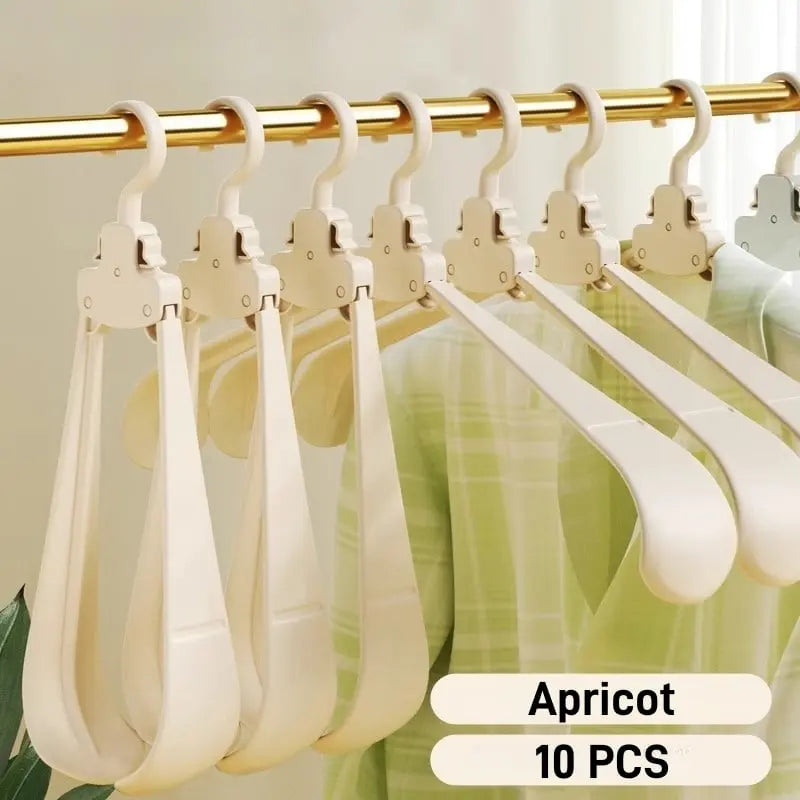 Rynx | Robust foldable clothes hanger with one-button function and crease pRedection