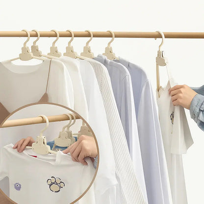 Rynx | Robust foldable clothes hanger with one-button function and crease pRedection