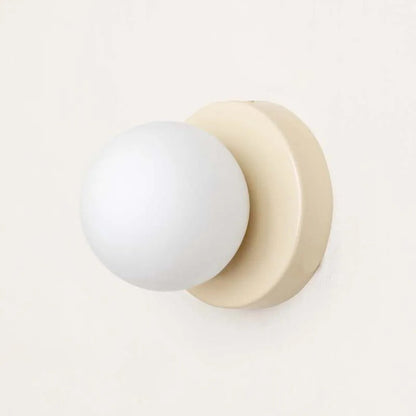 Rynx | LumiGlobe - Modern wall lamp with glass block in Mid-Century style