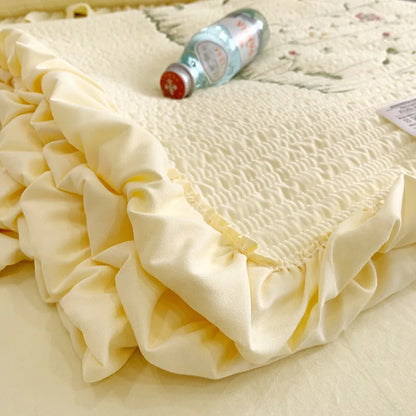 Rynx | embroidered throw blanket