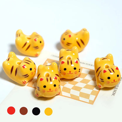 Rynx | Charming anime-inspired lucky cat ceramic beads for creative jewelry projects - 15x21mm porcelain essentials with vertical hole