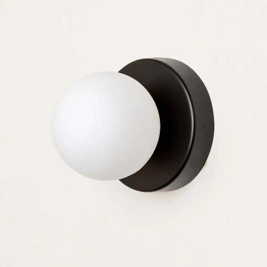 Rynx | LumiGlobe - Modern wall lamp with glass block in Mid-Century style