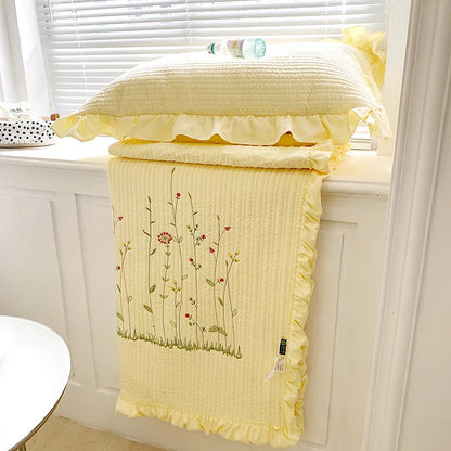 Rynx | embroidered throw blanket