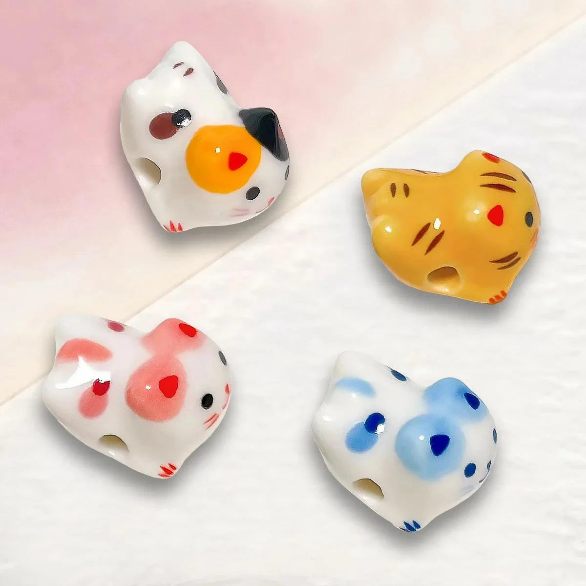 Rynx | Charming anime-inspired lucky cat ceramic beads for creative jewelry projects - 15x21mm porcelain essentials with vertical hole