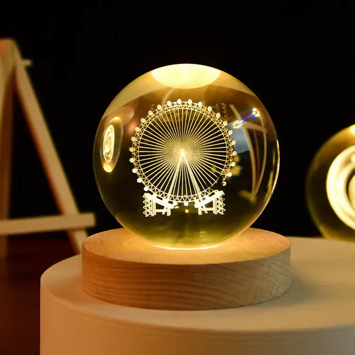 RYNX | 3D-Crystal-Night-Lights – Unique Gifts For All Occasions A Ferris wheel is a large, rotating amusement ride that is often found at fairs or in amusement parks. It consists of a tall structure with gondola-like cabins that provide passengers with a view from a great height.
