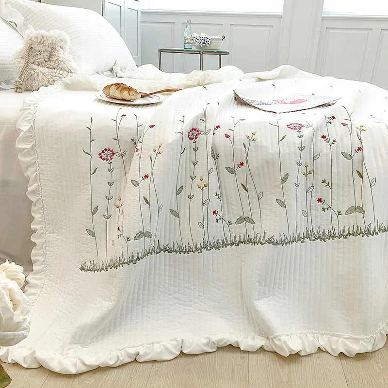 Rynx | embroidered throw blanket
