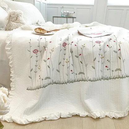 Rynx | embroidered throw blanket
