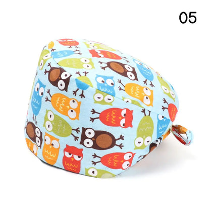 Rynx | Adjustable surgical cap with ponytail holder and buttons