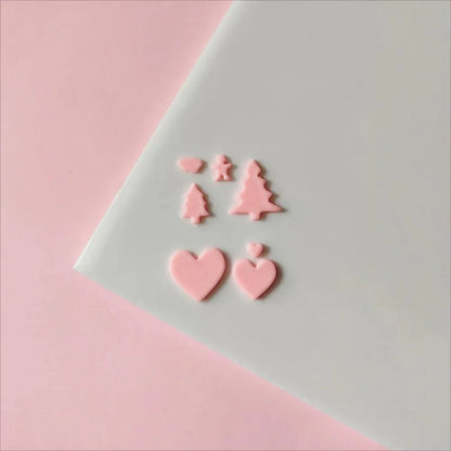 Rynx | Festive Creations Earring shape: Design Playful Red Lips & Charming Christmas House Shapes