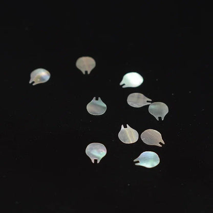 Rynx | Stunning natural abalone shell fish tail pieces for creative jewelry and instrument inlays