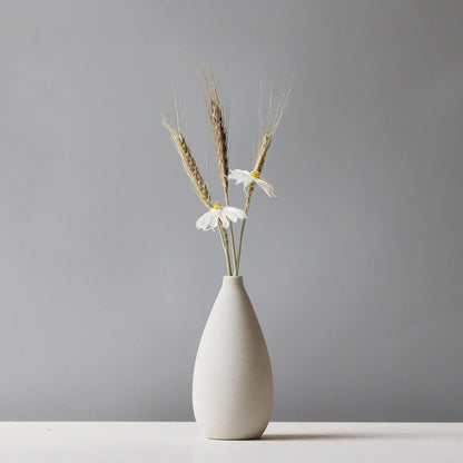 Rynx | Modern solid color vases with flowers