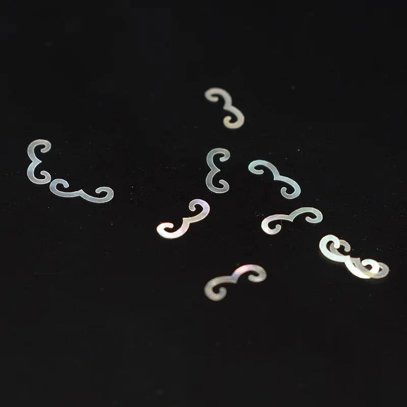 Rynx | Stunning natural abalone shell fish tail pieces for creative jewelry and instrument inlays