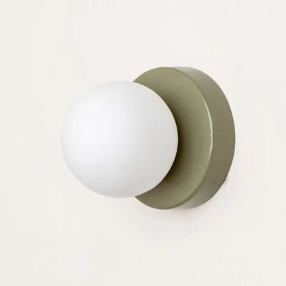 Rynx | LumiGlobe - Modern wall lamp with glass block in Mid-Century style
