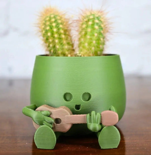 Rynx | Self-watering Flower Pot – Cute face with flexible legs!