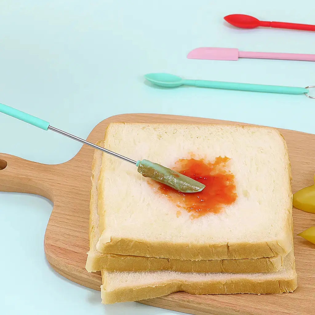 Rynx | Telescopic Silicone Scraper – Adjustable Kitchen Helper for Thorough Scraping