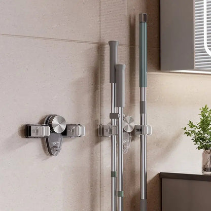 Rynx | Space-saving holder for brooms & tools – Quickly mounted, no drilling