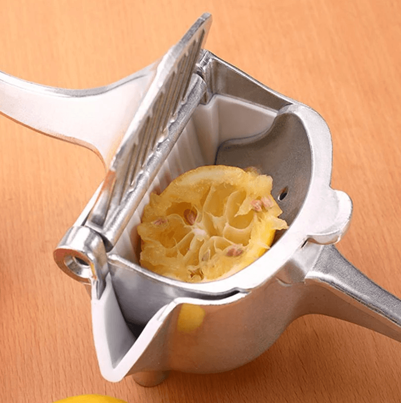 Rynx | Manual Fruit Juicer Squeezer