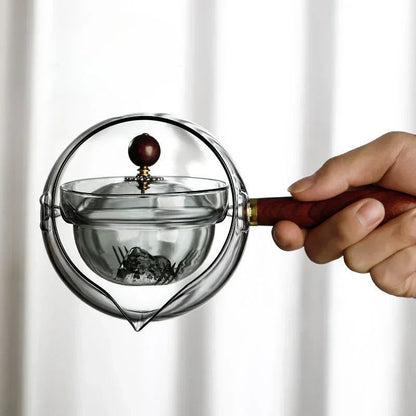 Rynx | Rotary-glass-teapot with infuser.